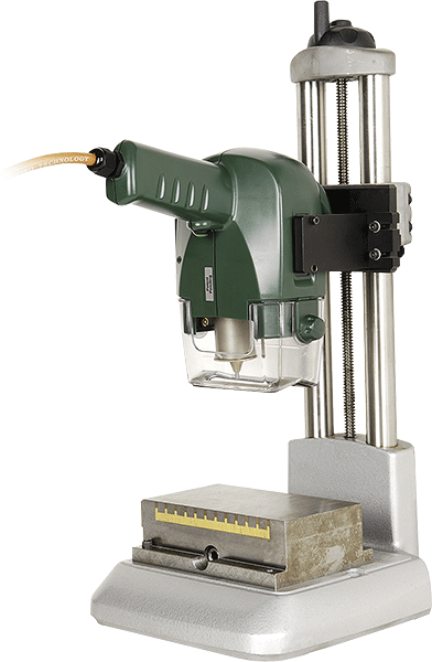Green electric pin-marking machine mounted on a vertical stand with a flat metal base
