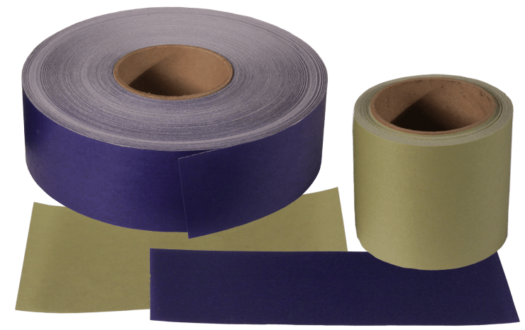Two large rolls of sandpaper and two flat sheets in purple and yellow-green
