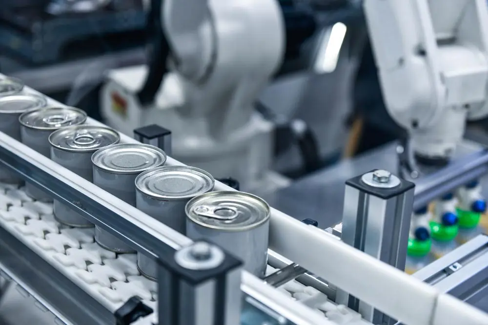 metal cans in an assembly line
