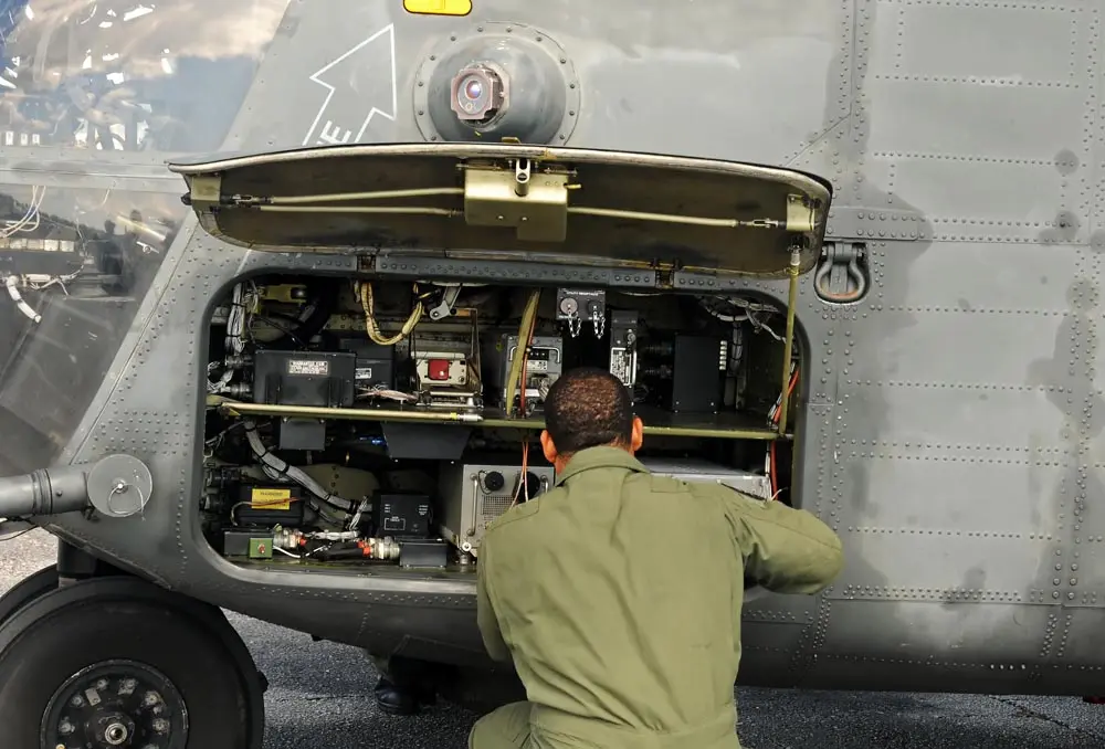 man working on plane