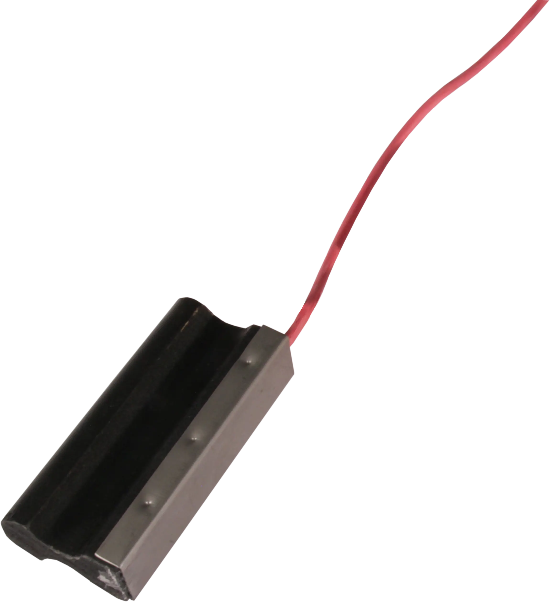 Carbon brush with an attached red wire against a black background