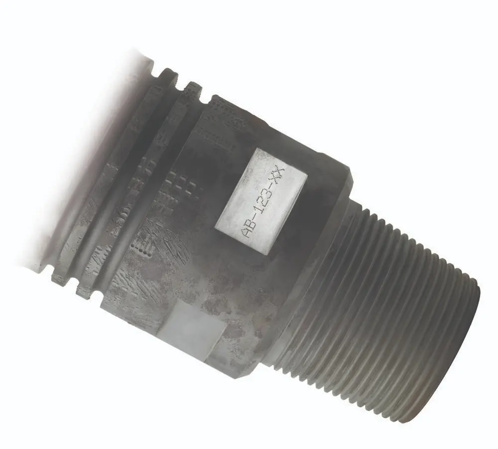 Metal pipe fitting with threaded end and text label AB-123-XX